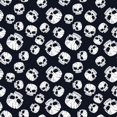Seamless black and white vector skull background