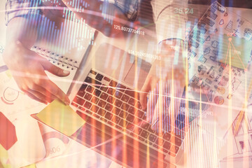 Double exposure of man and woman working together and forex graph hologram drawing. Financial analysis concept. Computer background. Top View.