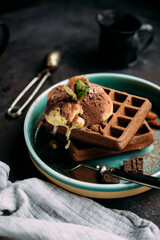 Belgian chocolate waffles with ice cream in a plate