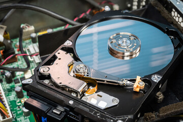 Close up of hard disk hard disk magnetic tape inside, open cover hard disk in computer or server....