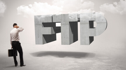 Rear view of a businessman standing in front abbreviation