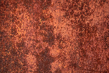 Empty rusty corrosion and oxidized background. Grunge rusted metal texture. Worn metallic iron wall