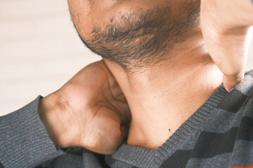 Naklejka premium man suffering chronic neck pain 