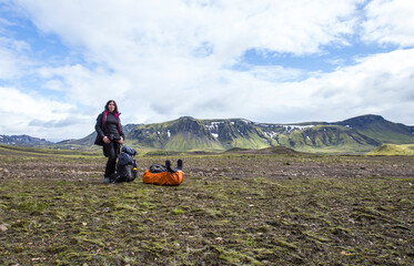 Fototapeta na wymiar A young hiker in the Landmannalaugar trekking huts, Iceland