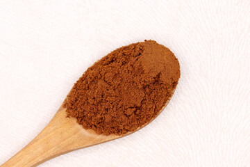 Turkish coffee in a wooden spoon