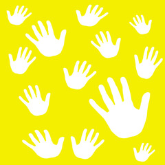 Fototapeta na wymiar white hands on a yellow background