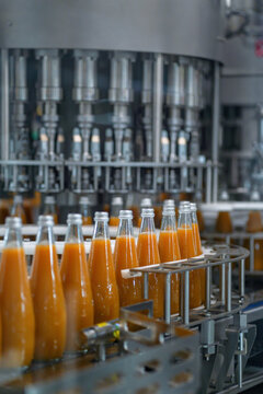 Juice factory, product line, peach juice bottle on the product line