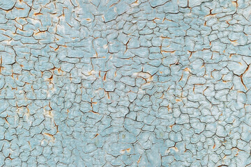 Crackle paint texture. Blue  grunge pattern of natural oil paint crackle. Cool texture of cracks, stains, scratches, splash, etc for print and design.