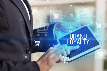 Young person makes a purchase through a tablet