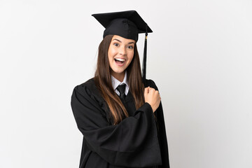 Teenager Brazilian university graduate over isolated white background celebrating a victory