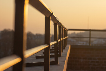 steel handrail during sunset 