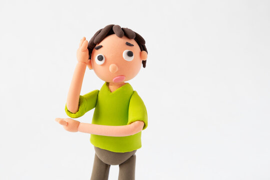 粘土の考えている男の子