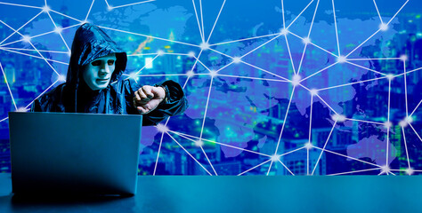 Anonymous computer hacker in white mask.dark face using laptop computer for cyber attack and checking time on digital world map city background, Data thief,darknet and cyber security concept