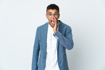 Young business Brazilian man isolated on white background shouting with mouth wide open