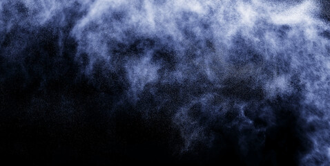 A stream of water and a cloud of drops