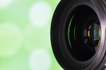 Equipment videographer and photographer. Lenses on the table against the background of bright...