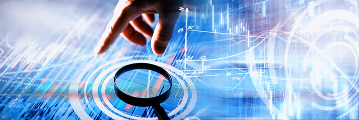 Business concept. Information technology and data processing. Hands over the screen with graphic data. A modern software product in business.