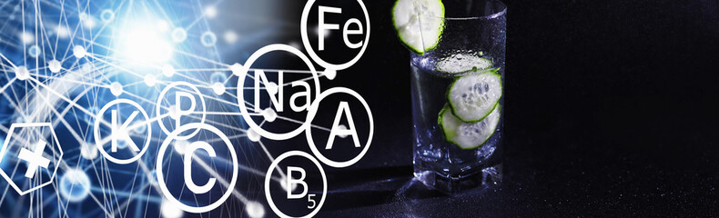 Naklejka premium Cucumber water. Drinking water with fresh cucumber. Mineral water. Healthy, mineral-rich, refreshing water with cucumber.