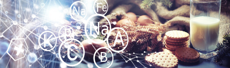 Fresh crunchy cookie with wheat and gluten on a black table. Bakery and grocery concept. Fresh, healthy sorts of rye and white cookies on sackcloth with milk. Homemade cookie with cereals.