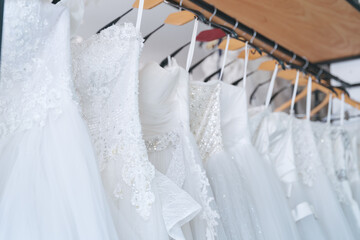 Close up white Wedding Dresses in dress store, Bride dress