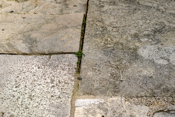 Weathered sand-lime stone as a brick partially repaired