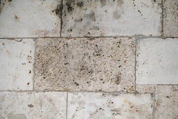 Weathered sand-lime stone as a brick partially repaired