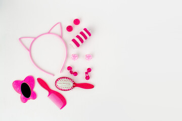 Obraz na płótnie Canvas Pink hair set accessories for little girl
