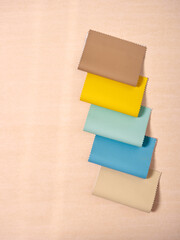 Leather samples in various colors.