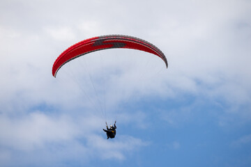 Norwegian flag on background of fjord and small mountains,