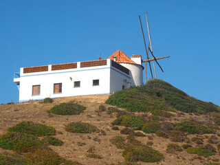 Windmill in Carrapateira at the Alentejo coast of Portugal