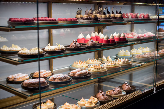 Sweet different desserts on the shopwindow