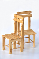 classical wooden chairs against white background
