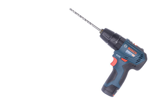 Belgrade - 09.02.2021. - Blue Bosch Jigsaw GSB 12V-30 above white background