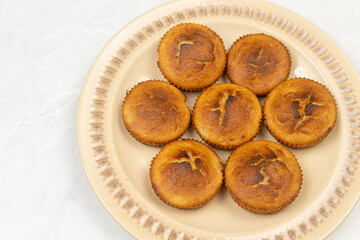Cup cakes served on the plate with copy space