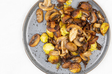 Cooked Brussel Sprouts with Mushrooms and served on the plate