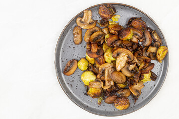 Cooked Brussel Sprouts with Mushrooms and served on the plate