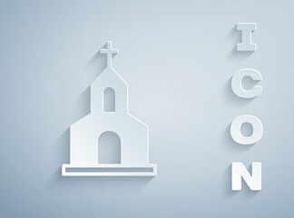 Paper cut Church building icon isolated on grey background. Christian Church. Religion of church. Paper art style. Vector