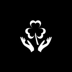 Shamrock icon isolated on dark background