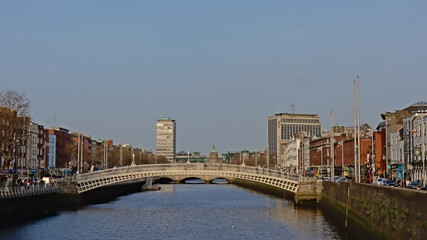 Naklejka premium Ha`penny pedestrian bridge over River Liffey in the city of Dublin, Ireland 