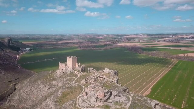 aereal drone view of The Castle of Oreja is a ruined abandoned place in Toledo with a beautiful landscape panorama. A travel tourist destination to a muslim and knighthood fortress 