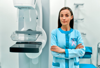 International symbol for October Breast Cancer Awareness Month. Female doctor with pink awareness...