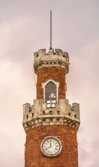 Old brick fortress gothic clock tower