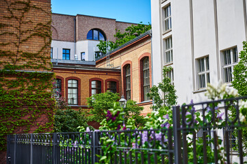 Fototapeta na wymiar Sight of buildings in a backyard near the river Spree in downtown Berlin, Germany. The focus lies in the background of the photo.
