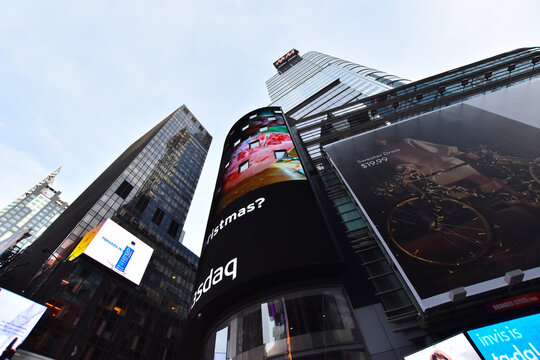 Manhattan, New York City, United States - December 8, 2019. Evening scene on Broadway street,  Times Square,  Manhattan (New York City) with billboards and advertisements.