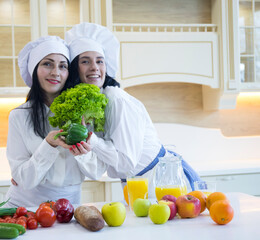 family cooking together. Happy day. Kitchen. Vegetables. 