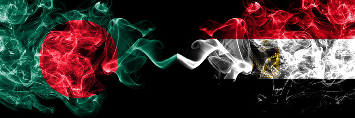 Bangladesh, Bangladeshi vs Egypt, Egyptian smoky mystic flags placed side by side. Thick colored silky abstract smokes flags.