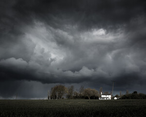 Fototapeta na wymiar Farmhouse in a storm