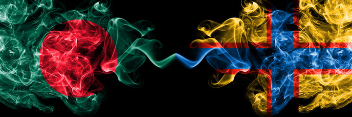 Bangladesh, Bangladeshi vs Ingrian people smoky mystic flags placed side by side. Thick colored silky abstract smokes flags.