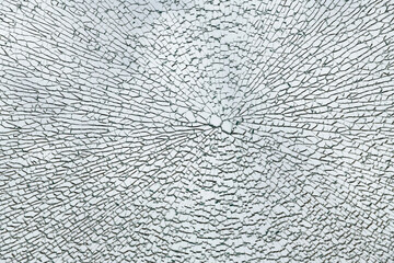 Cracks in triplex glass. Selective focus.