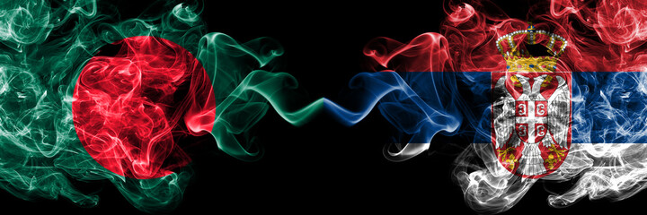 Bangladesh, Bangladeshi vs Serbia, Serbian smoky mystic flags placed side by side. Thick colored silky abstract smokes flags.